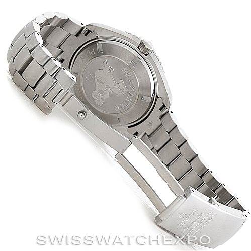 The image shows the back case and metal bracelet of the Omega Planet Ocean 2200.50.00 Men's Stainless Steel Black Dial 2200.50.00 Men's Stainless Steel Black Dial watch at an angle, highlighting the clasp and engraved case back.