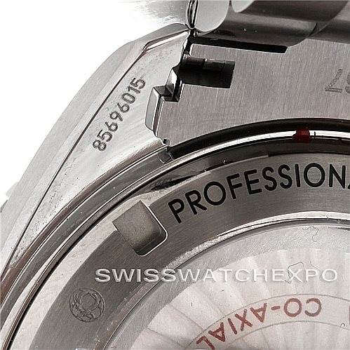 The image shows a close-up of the back case and bracelet of the Omega Planet Ocean 232.90.46.21.03.001 Men's Titanium Blue Dial 232.90.46.21.03.001 Men's Titanium Blue Dial watch, highlighting the markings on the case.