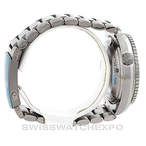 The image shows a side profile view of an Omega Planet Ocean 232.90.46.21.03.001 Men's Titanium Blue Dial 232.90.46.21.03.001 Men's Titanium Blue Dial watch, highlighting its bracelet and side case with crown.