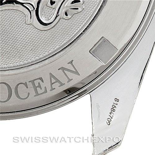 The image shows the back case and part of one lug of an Omega Planet Ocean 2209.50.00 Men
s Stainless Steel Black Dial 2209.50.00 Men
s Stainless Steel Black Dial watch.