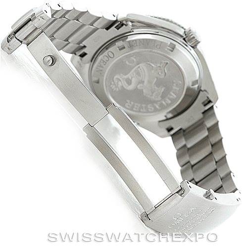 The image shows the back case and bracelet clasp of the Omega Planet Ocean 2209.50.00 Men
s Stainless Steel Black Dial 2209.50.00 Men
s Stainless Steel Black Dial watch at an angle.