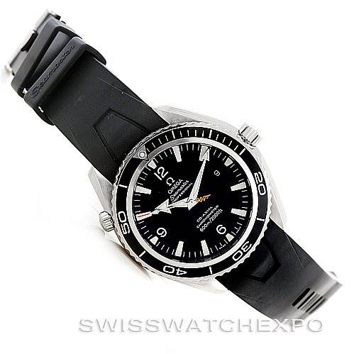 The image shows an Omega Planet Ocean 2907.50.91 Men's Stainless Steel Black Dial 2907.50.91 Men's Stainless Steel Black Dial watch at an angled top view, highlighting its black dial, bezel, and black rubber strap.