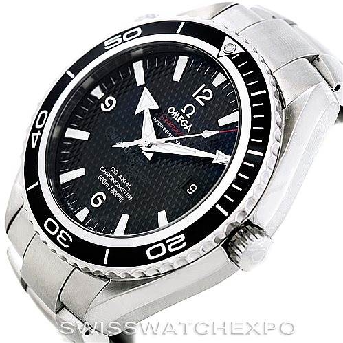 The image shows an angled view of the Omega Planet Ocean 222.30.46.20.01.001 Men's Stainless Steel Black Dial 222.30.46.20.01.001 Men's Stainless Steel Black Dial watch, highlighting the bezel, dial, crown, and part of the bracelet.