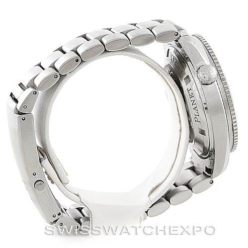 The image shows a side and partial back view of an Omega Planet Ocean 2209.50.00 Men
s Stainless Steel Black Dial 2209.50.00 Men
s Stainless Steel Black Dial watch focusing on the bracelet and crown.