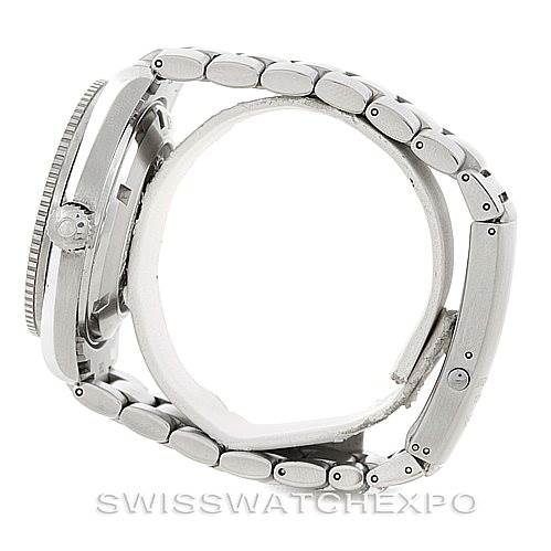 The image shows a side view of an Omega Planet Ocean 2209.50.00 Men
s Stainless Steel Black Dial 2209.50.00 Men
s Stainless Steel Black Dial watch, highlighting its bracelet and case.