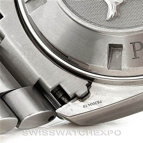 The image shows a close-up of the case back and bracelet of an Omega Planet Ocean 2210.51.00 Men
s Stainless Steel Black Dial 2210.51.00 Men
s Stainless Steel Black Dial watch.