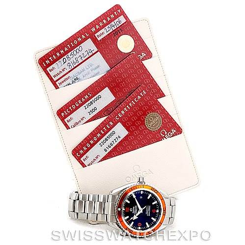 The image shows the Omega Planet Ocean 2208.50.00 Men
s Stainless Steel Black Dial 2208.50.00 Men
s Stainless Steel Black Dial watch, a leather card holder, and red warranty, pictograms, and chronometer certificate cards.