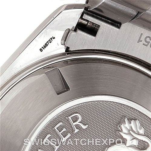 The image shows the close-up of the back case and bracelet hinge of an Omega Planet Ocean 2208.50.00 Men
s Stainless Steel Black Dial 2208.50.00 Men
s Stainless Steel Black Dial watch.