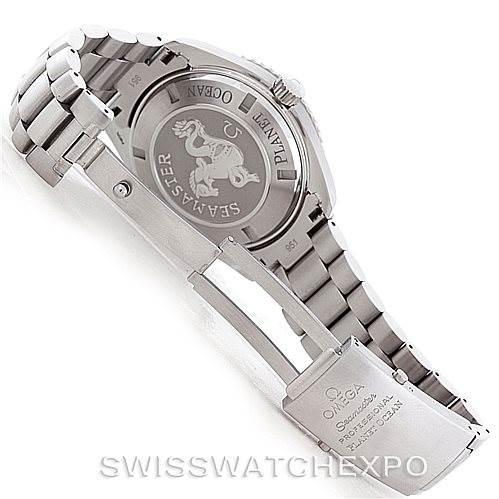 The image shows the Omega Planet Ocean 2208.50.00 Men
s Stainless Steel Black Dial 2208.50.00 Men
s Stainless Steel Black Dial watch from a rear angle, highlighting the case back and bracelet clasp.