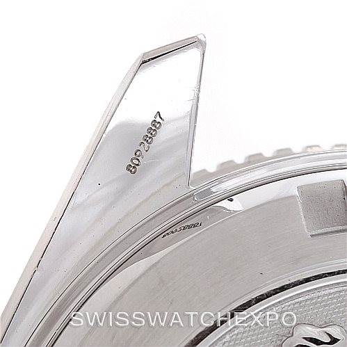 This image shows a close-up view of the Omega Planet Ocean 2909.50.83 Men's Stainless Steel Black Dial 2909.50.83 Men's Stainless Steel Black Dial watch's bezel and lug.