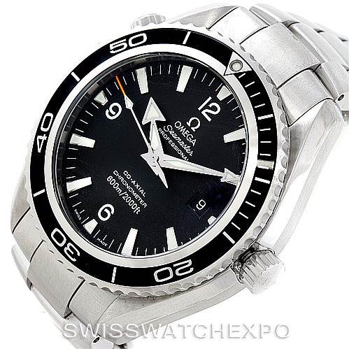 The image shows a close-up of the Omega Planet Ocean 2200.50.00 Men
s Stainless Steel Black Dial 2200.50.00 Men
s Stainless Steel Black Dial watch
s face, bezel, crown, and metal bracelet from an angled side view.