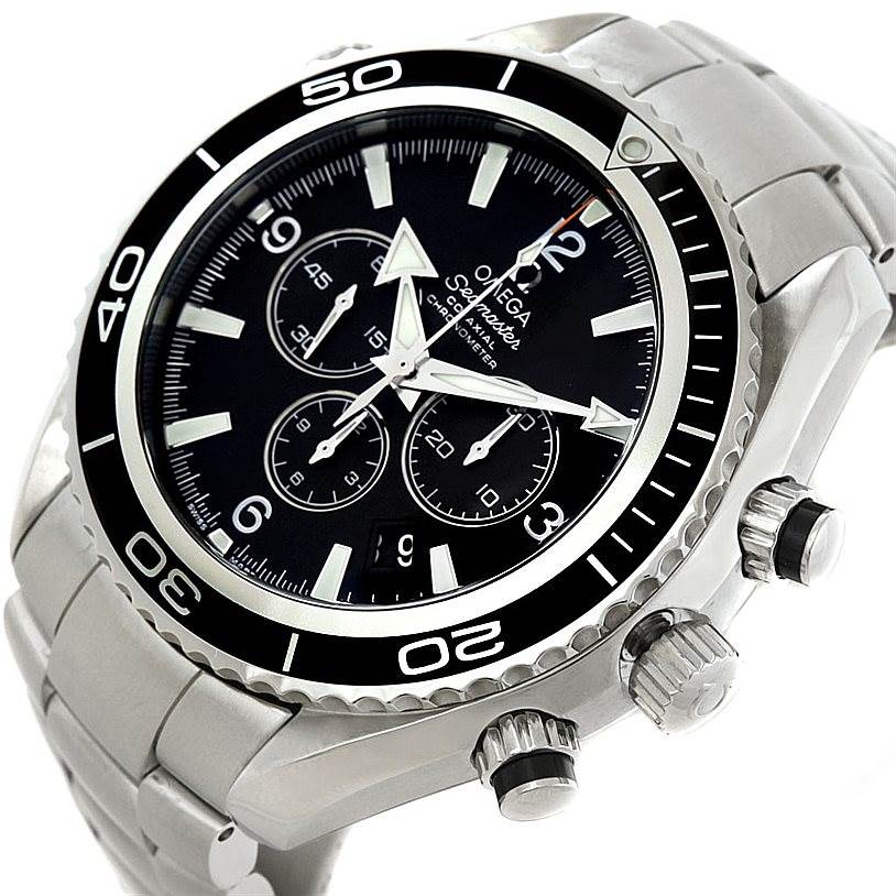 The Omega Planet Ocean 2210.50.00 Men
s Stainless Steel Black Dial 2210.50.00 Men
s Stainless Steel Black Dial watch is shown at a tilted angle, highlighting the face, bezel, and crown.