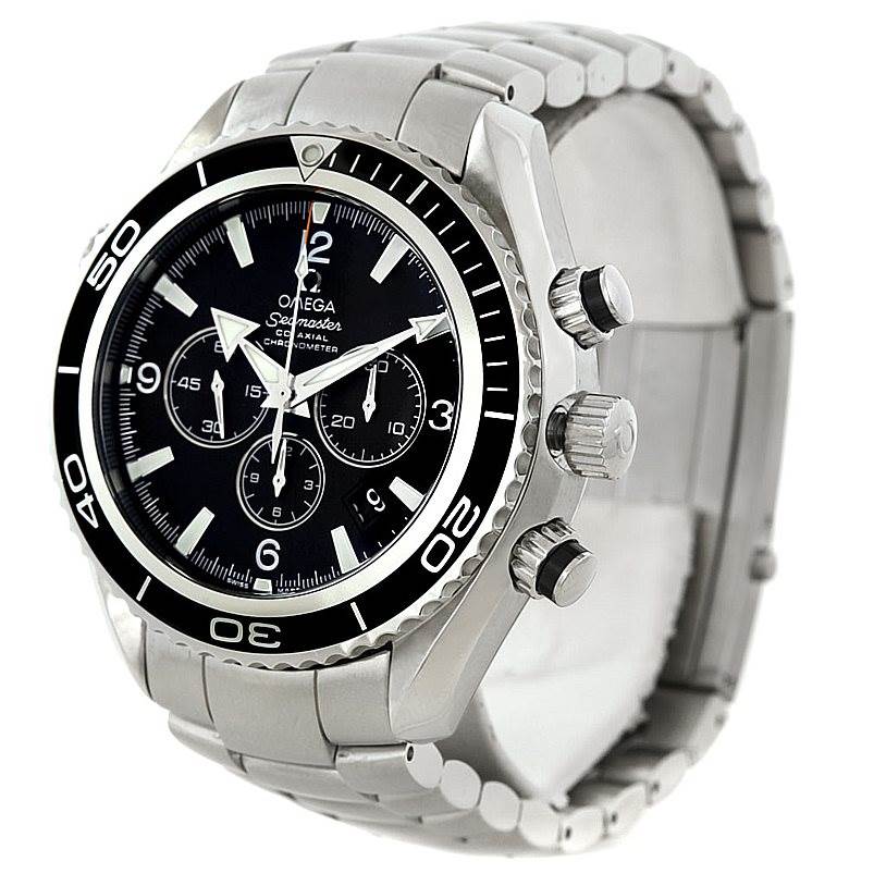 The Omega Planet Ocean 2210.50.00 Men
s Stainless Steel Black Dial 2210.50.00 Men
s Stainless Steel Black Dial watch is shown from a three-quarter view, highlighting its black dial, bezel, and stainless steel bracelet.