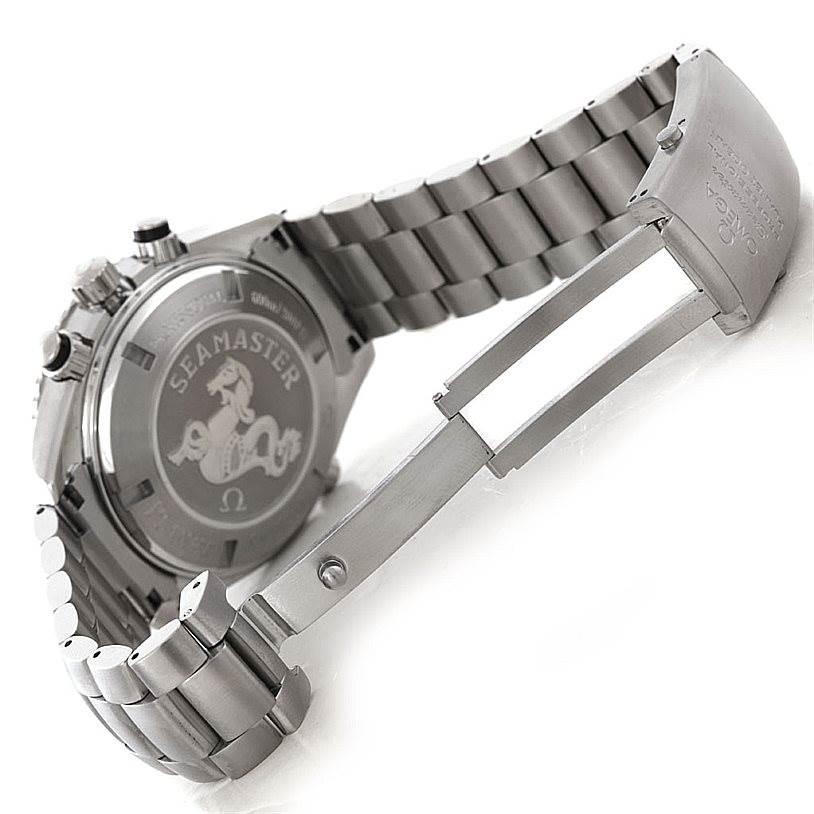 The image shows the back case and metal bracelet of an Omega Planet Ocean 2210.50.00 Men
s Stainless Steel Black Dial 2210.50.00 Men
s Stainless Steel Black Dial watch, featuring the Seamaster engraving.