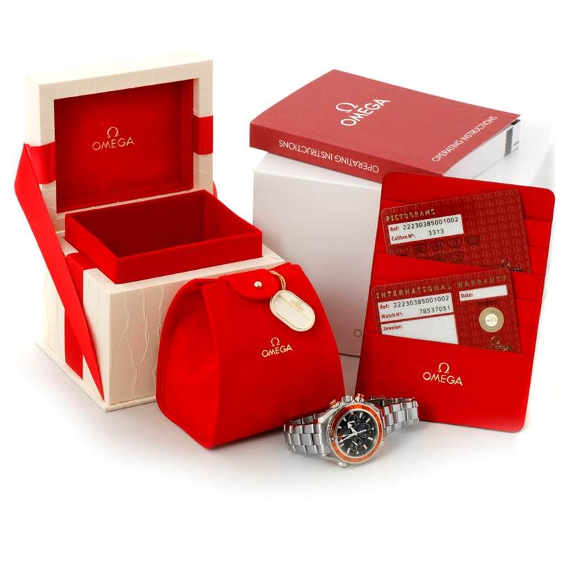 The image shows an Omega Planet Ocean 222.30.38.50.01.002 Stainless Steel Black Dial 222.30.38.50.01.002 Stainless Steel Black Dial watch with its red box, operating instructions, warranty cards, and a red pouch.