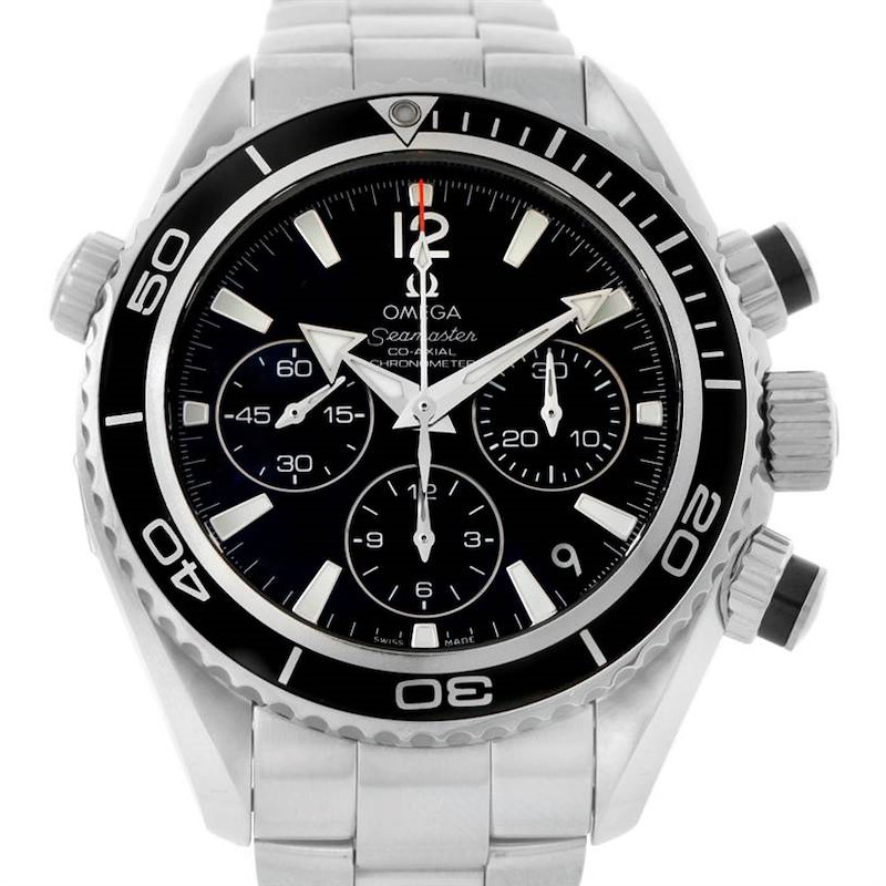 The image shows a front view of the Omega Planet Ocean model, highlighting the dial, bezel, and chronograph subdials.