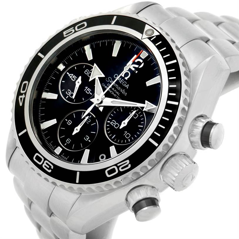 The image shows an angled view of the Omega Planet Ocean 222.30.38.50.01.001 Stainless Steel Black Dial 222.30.38.50.01.001 Stainless Steel Black Dial watch, highlighting the face, bezel, crown, and chronograph pushers.