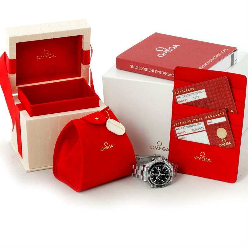 The image shows an Omega Planet Ocean 222.30.38.50.01.001 Stainless Steel Black Dial 222.30.38.50.01.001 Stainless Steel Black Dial watch with its opened box, red pouch, operating instructions, pictogram and warranty cards.