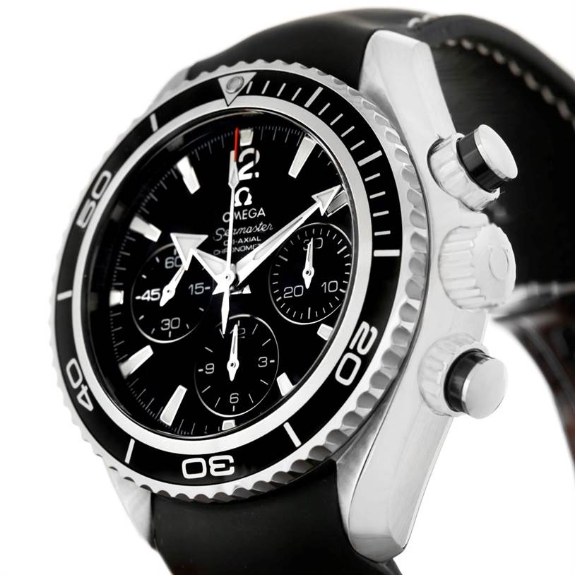 The Omega Planet Ocean 222.32.38.50.01.001 Stainless Steel Black Dial 222.32.38.50.01.001 Stainless Steel Black Dial watch is shown at an angled close-up, highlighting its dial, bezel, crown, and push buttons.