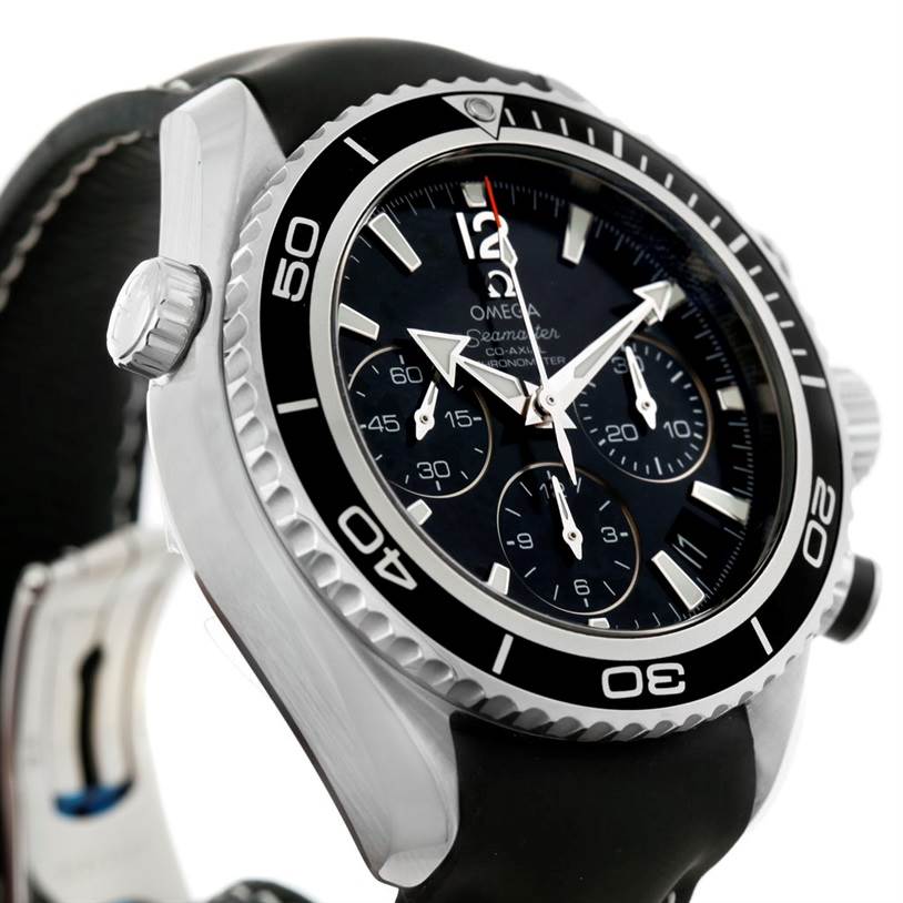 The image shows a close-up side angle of an Omega Planet Ocean 222.32.38.50.01.001 Stainless Steel Black Dial 222.32.38.50.01.001 Stainless Steel Black Dial watch, highlighting the bezel, crown, and part of the strap.