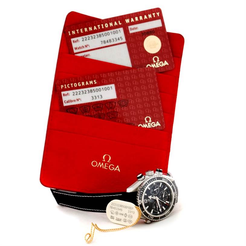The image shows the Omega Planet Ocean 222.32.38.50.01.001 Stainless Steel Black Dial 222.32.38.50.01.001 Stainless Steel Black Dial watch with international warranty and pictogram cards in a red Omega pouch.