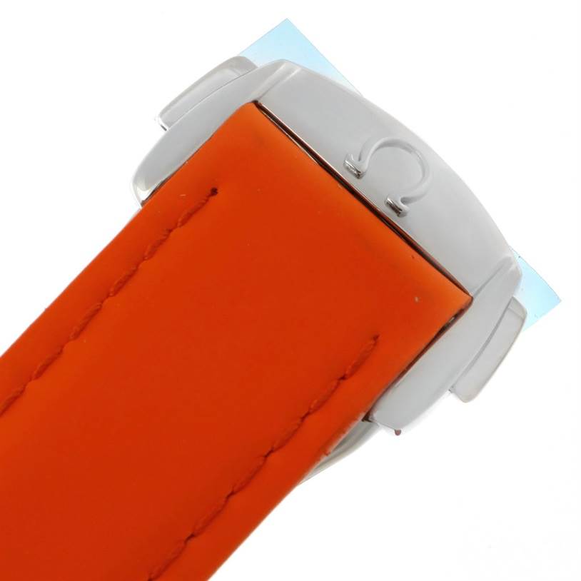 This image shows the clasp and part of the orange strap of an Omega Planet Ocean 222.32.38.50.01.003 Stainless Steel Black Dial 222.32.38.50.01.003 Stainless Steel Black Dial watch from a close-up angle.