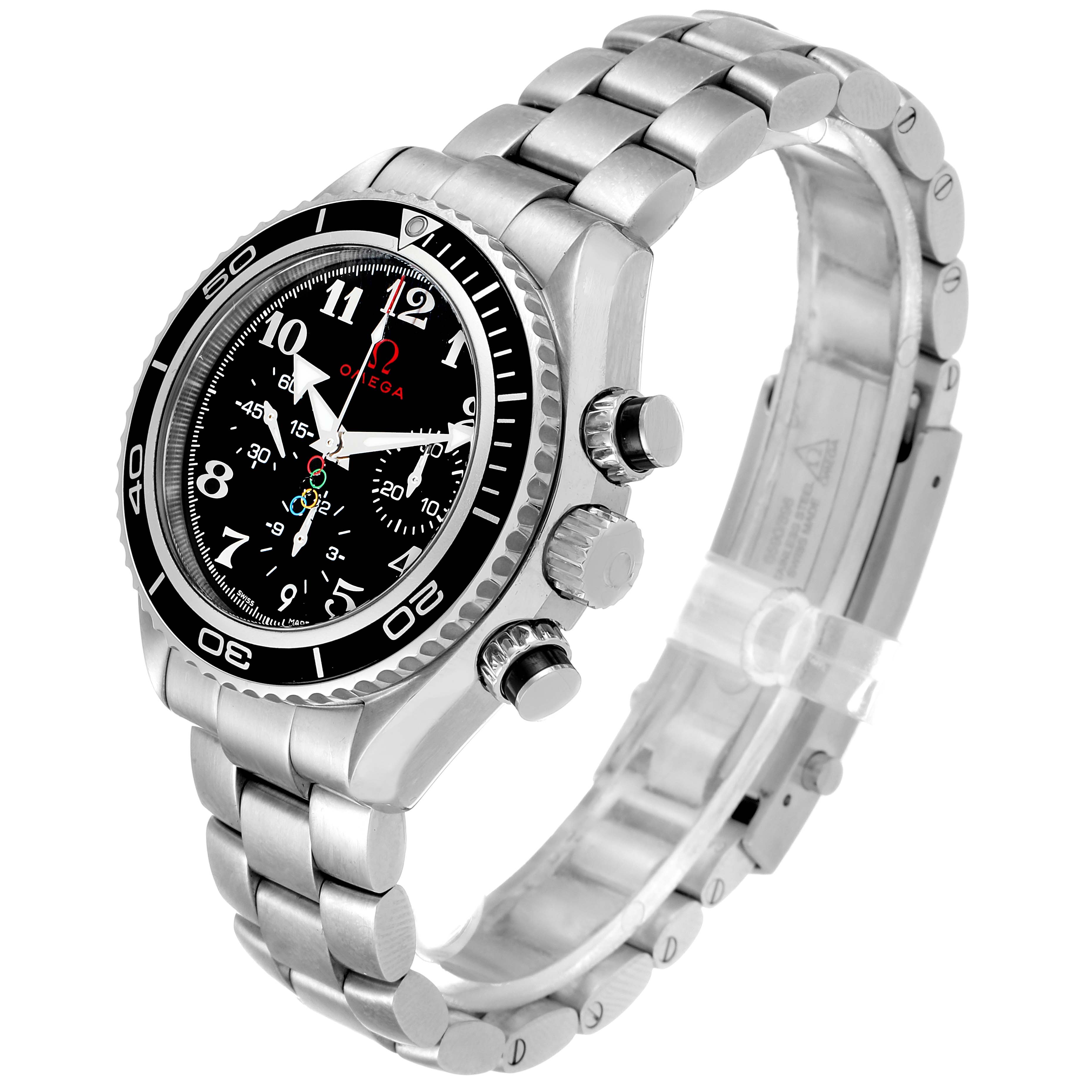 The image shows a side-angle view of a Planet Ocean model by Omega, highlighting the dial, bezel, crown, and bracelet.