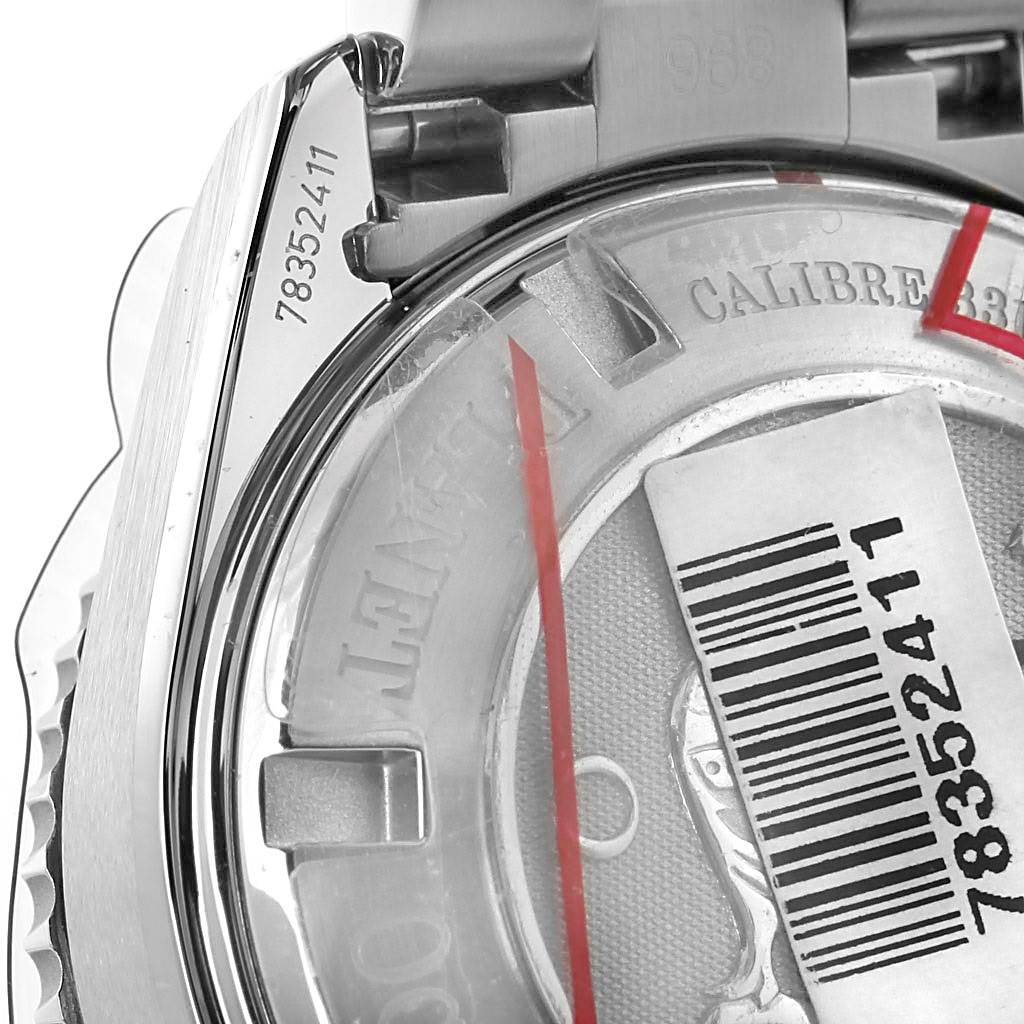 The image shows the back case and bracelet attachment of an Omega Planet Ocean 222.30.38.50.01.001 Stainless Steel Black Dial 222.30.38.50.01.001 Stainless Steel Black Dial watch, focusing on the serial number and calibre details.