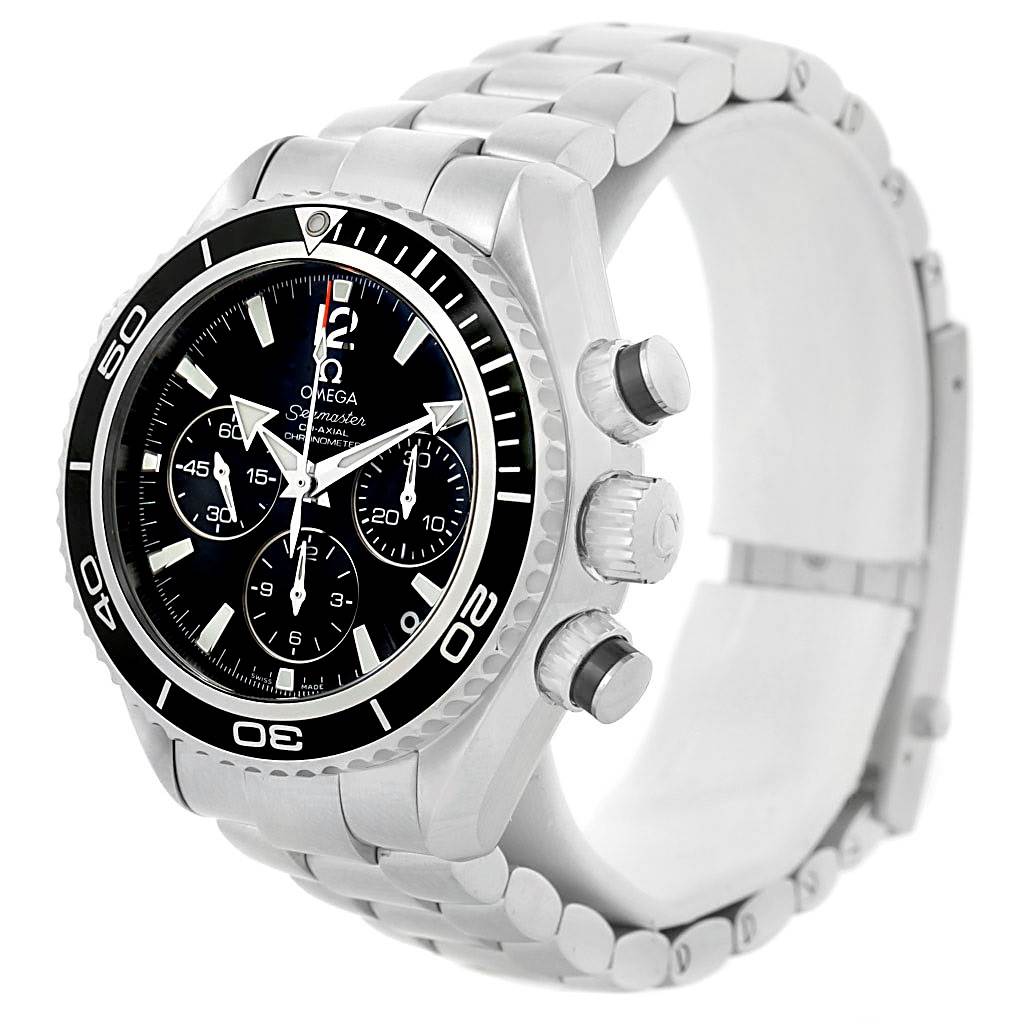 The image shows an Omega Planet Ocean 222.30.38.50.01.001 Stainless Steel Black Dial 222.30.38.50.01.001 Stainless Steel Black Dial watch viewed from a side angle, highlighting the bezel, dial, and chronograph pushers.