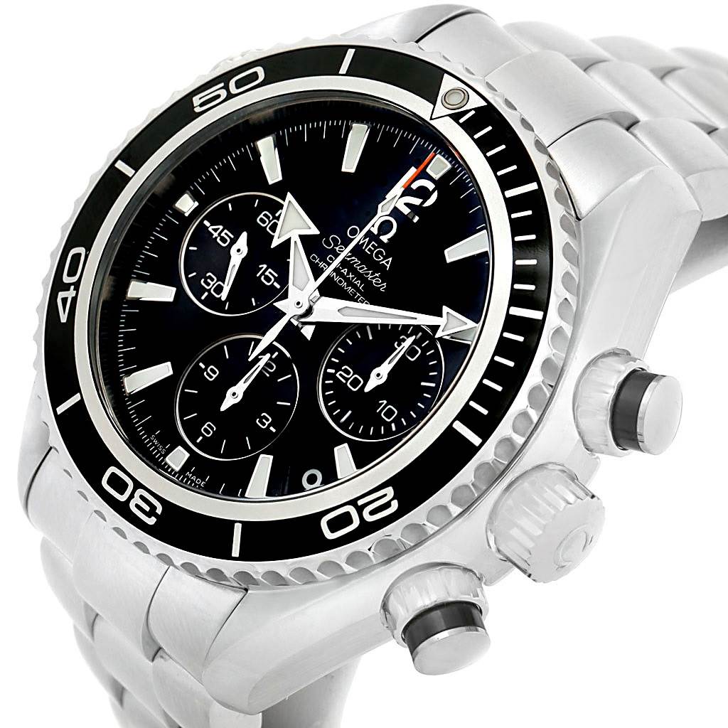 This image shows a close-up, angled view of an Omega Planet Ocean 222.30.38.50.01.001 Stainless Steel Black Dial 222.30.38.50.01.001 Stainless Steel Black Dial watch, highlighting the dial, bezel, and crown.