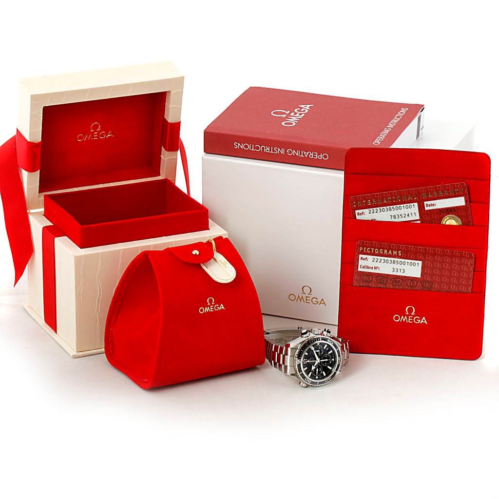 The image shows an Omega Planet Ocean 222.30.38.50.01.001 Stainless Steel Black Dial 222.30.38.50.01.001 Stainless Steel Black Dial watch with its box, manual, red pouch, and cards.
