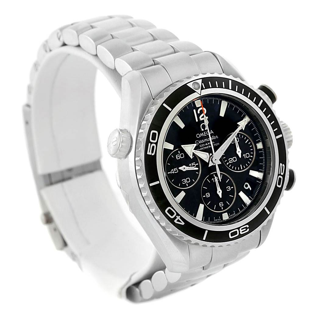 The image shows an Omega Planet Ocean 222.30.38.50.01.001 Stainless Steel Black Dial 222.30.38.50.01.001 Stainless Steel Black Dial watch at a slight angle, highlighting its bezel, dial, and metal bracelet.