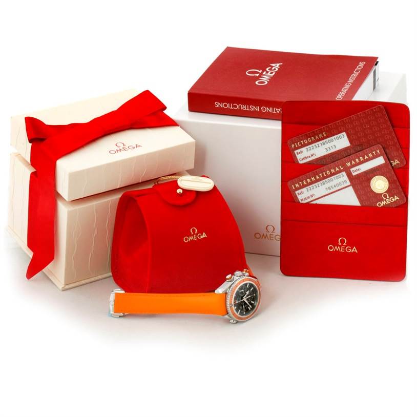 The Omega Planet Ocean 222.32.38.50.01.003 Stainless Steel Black Dial 222.32.38.50.01.003 Stainless Steel Black Dial watch is shown with packaging, warranty cards, and an instruction booklet.