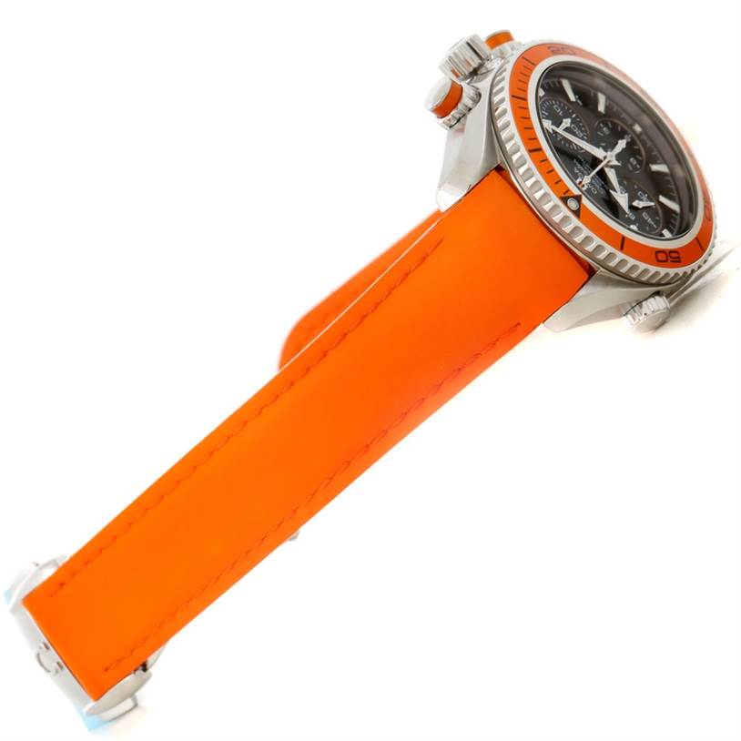 The image shows an Omega Planet Ocean 222.32.38.50.01.003 Stainless Steel Black Dial 222.32.38.50.01.003 Stainless Steel Black Dial watch at an oblique angle, highlighting its orange strap and bezel.