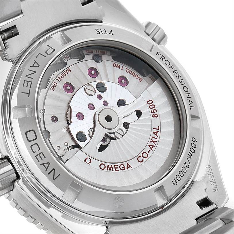 The image shows the back view of an Omega Planet Ocean 232.30.42.21.01.003 Men
s Stainless Steel Black Dial 232.30.42.21.01.003 Men
s Stainless Steel Black Dial watch, highlighting the Co-Axial 8500 movement.