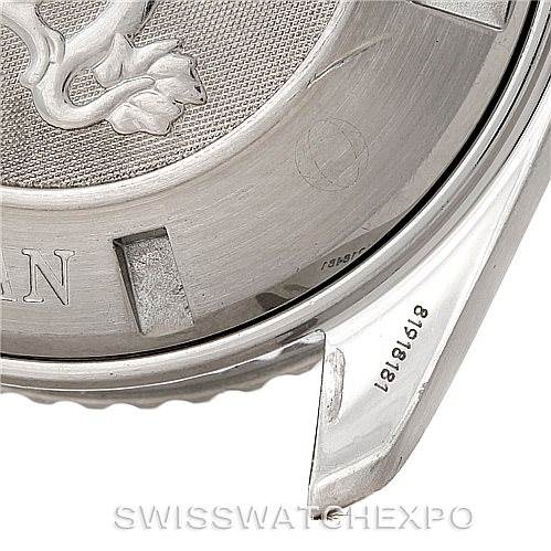 The image shows the case back and part of the lug of an Omega Planet Ocean 2200.50.00 Men
s Stainless Steel Black Dial 2200.50.00 Men
s Stainless Steel Black Dial watch, highlighting the serial number and engraving details.