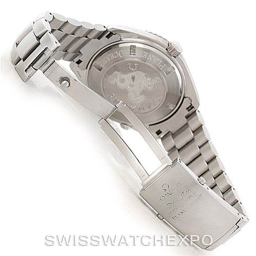 The image shows the clasp mechanism and case back of the Omega Planet Ocean 2200.50.00 Men
s Stainless Steel Black Dial 2200.50.00 Men
s Stainless Steel Black Dial watch from a side angle.