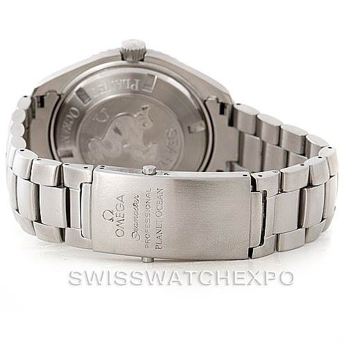 The image shows the back angle of an Omega Planet Ocean 2200.50.00 Men
s Stainless Steel Black Dial 2200.50.00 Men
s Stainless Steel Black Dial watch, highlighting the clasp and case back.