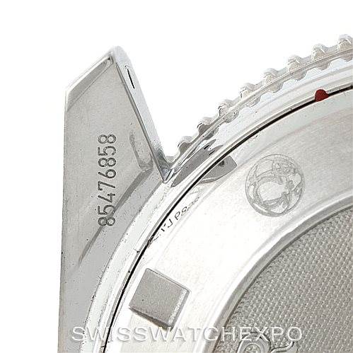 The image shows a close-up of the side and back of an Omega Planet Ocean 2201.50.00 Men
s Stainless Steel Black Dial 2201.50.00 Men
s Stainless Steel Black Dial watch, highlighting the serial number and partial case back.