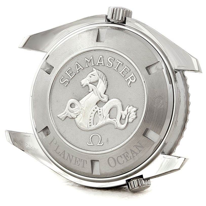 The image shows the back case of an Omega Seamaster Planet Ocean watch, featuring the Seamaster logo and text.