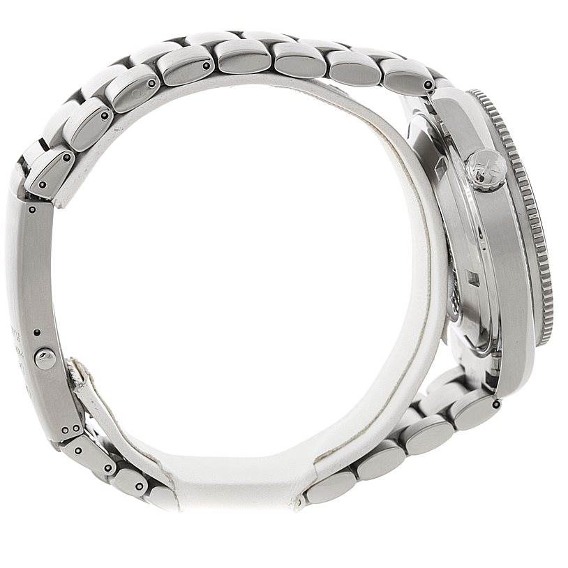 This image shows a side profile view of the Omega Planet Ocean 2209.50.00 Men
s Stainless Steel Black Dial 2209.50.00 Men
s Stainless Steel Black Dial watch, focusing on the metal bracelet and case.