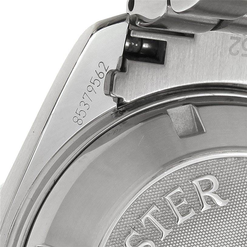 The image depicts the case back and part of the bracelet of an Omega Planet Ocean 2209.50.00 Men
s Stainless Steel Black Dial 2209.50.00 Men
s Stainless Steel Black Dial watch, showing its serial number.