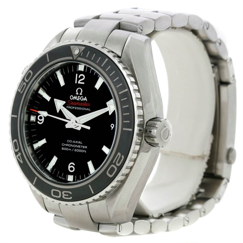 The image shows a three-quarter front view of an Omega Seamaster Planet Ocean watch, including its face, bezel, crown, and bracelet.