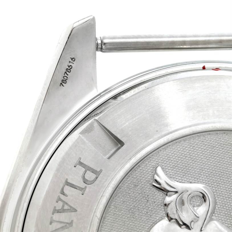 The image shows the back case and one lug of the Omega Planet Ocean 2918.50.83 Men's Stainless Steel Black Dial 2918.50.83 Men's Stainless Steel Black Dial watch, focusing on the engraved text and design.