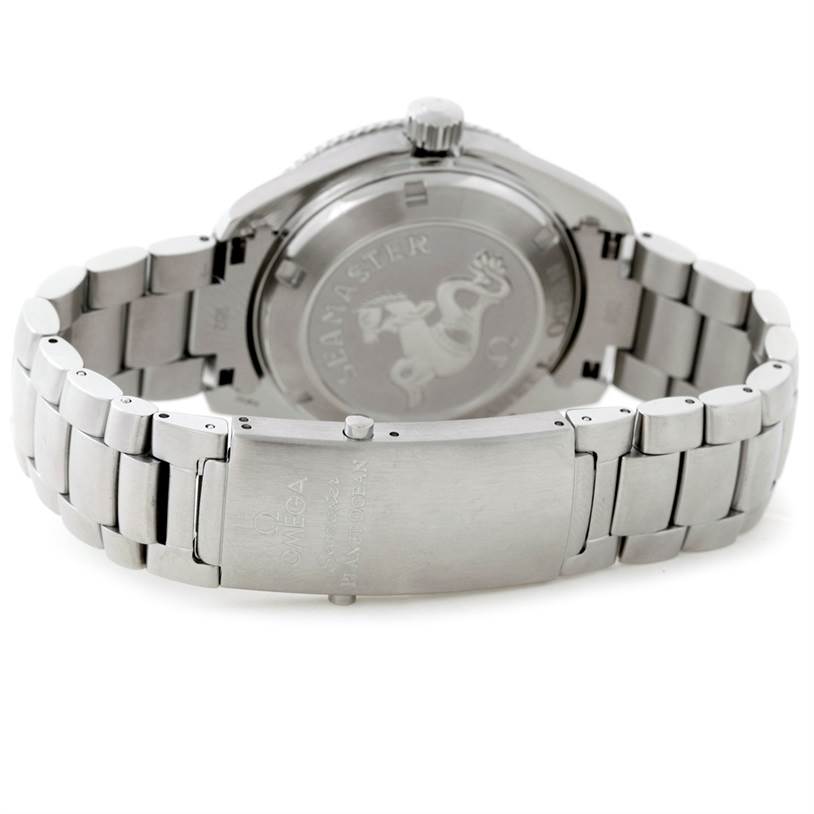 The image shows the back view of an Omega Planet Ocean 2209.50.00 Men
s Stainless Steel Black Dial 2209.50.00 Men
s Stainless Steel Black Dial watch, highlighting its clasp and engraved case back.