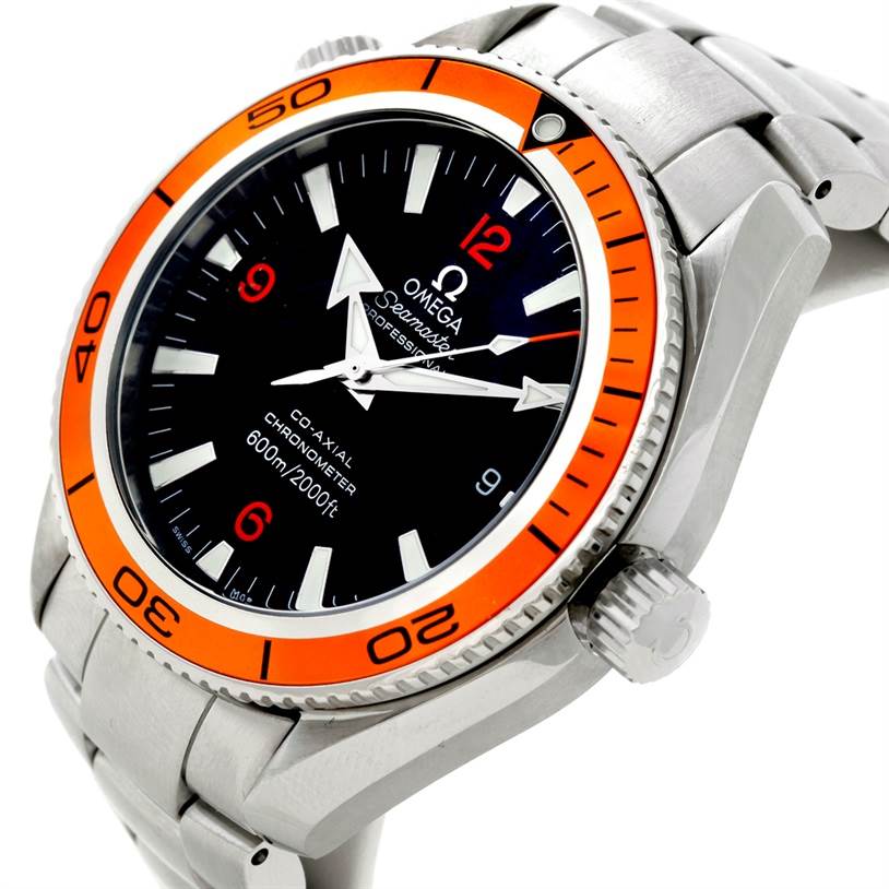 The Planet Ocean Omega watch is shown at a slight top-side angle, highlighting the crown, dial, and part of the bracelet.
