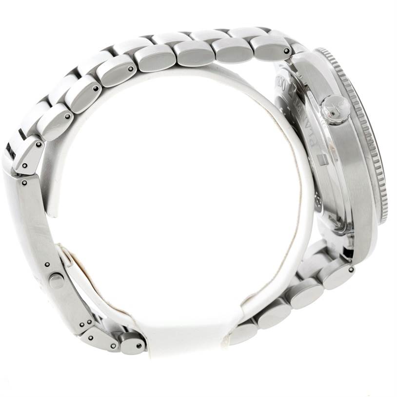 The image shows a side view of the Omega Planet Ocean 2209.50.00 Men
s Stainless Steel Black Dial 2209.50.00 Men
s Stainless Steel Black Dial watch, highlighting its metal bracelet and side of the case with the crown.