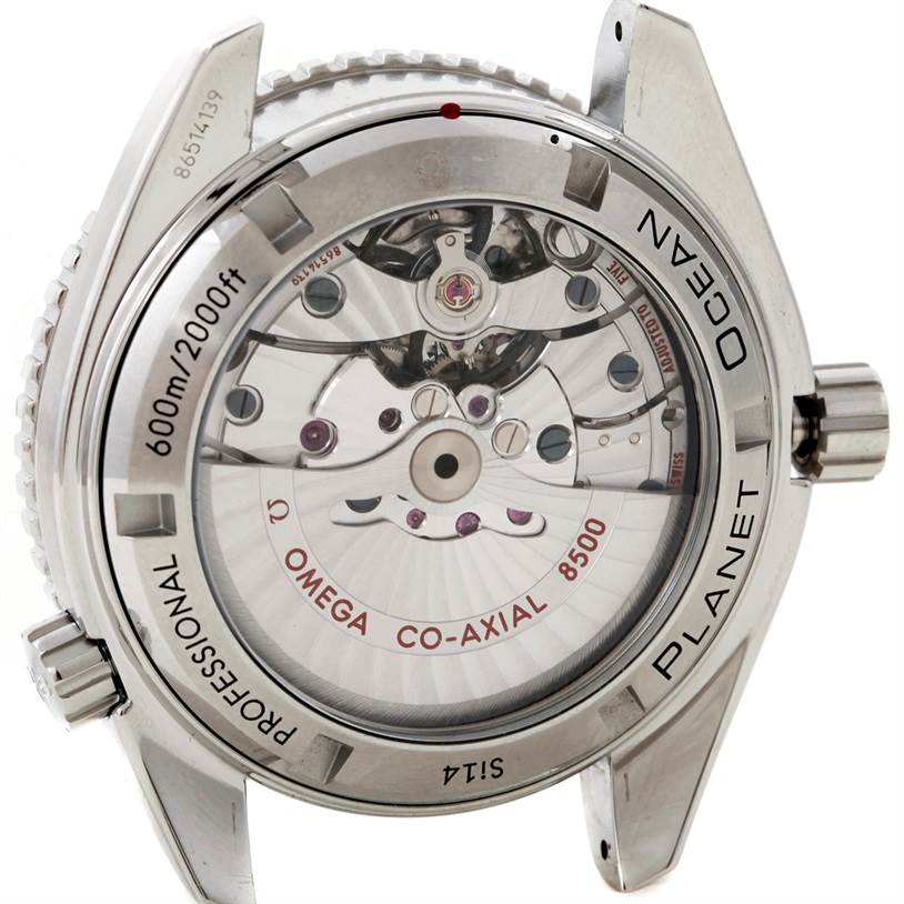 The image shows the back view of the Omega Planet Ocean 232.30.42.21.01.003 Men's Stainless Steel Black Dial 232.30.42.21.01.003 Men's Stainless Steel Black Dial watch, highlighting its movement and inner mechanisms.