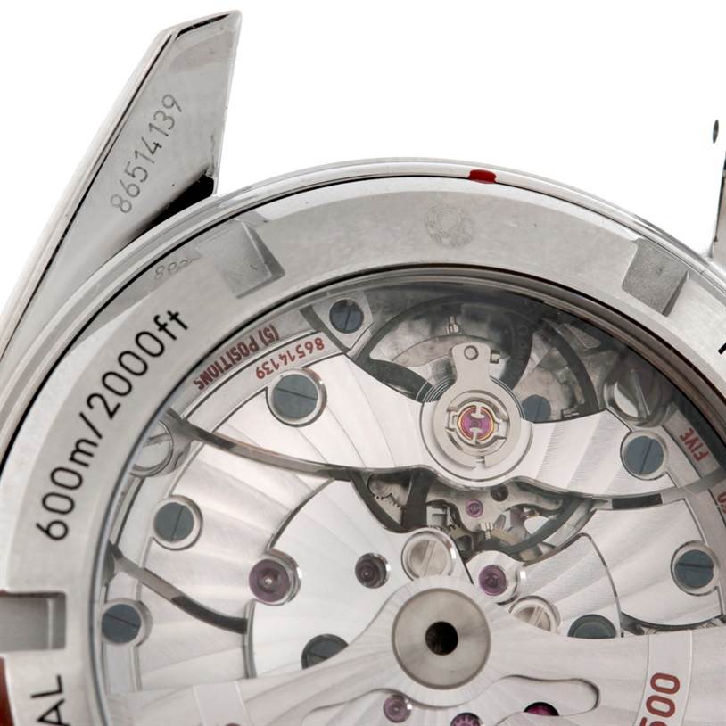 The image shows the back of the Omega Planet Ocean 232.30.42.21.01.003 Men's Stainless Steel Black Dial 232.30.42.21.01.003 Men's Stainless Steel Black Dial watch, displaying its inner mechanical movement.