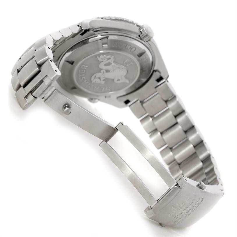 The image shows the back and clasp of the Omega Planet Ocean 2200.50.00 Men's Stainless Steel Black Dial 2200.50.00 Men's Stainless Steel Black Dial watch at an angle, highlighting the bracelet and engraved case back.